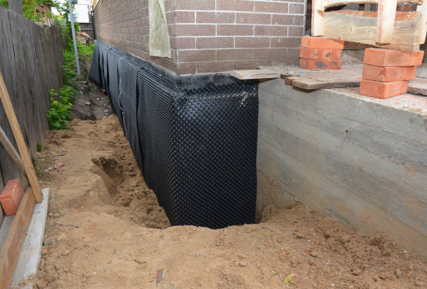 SJ Waterproofing Pros technician performing targeted Foundation Crack Repair assessment in Boyds, MD